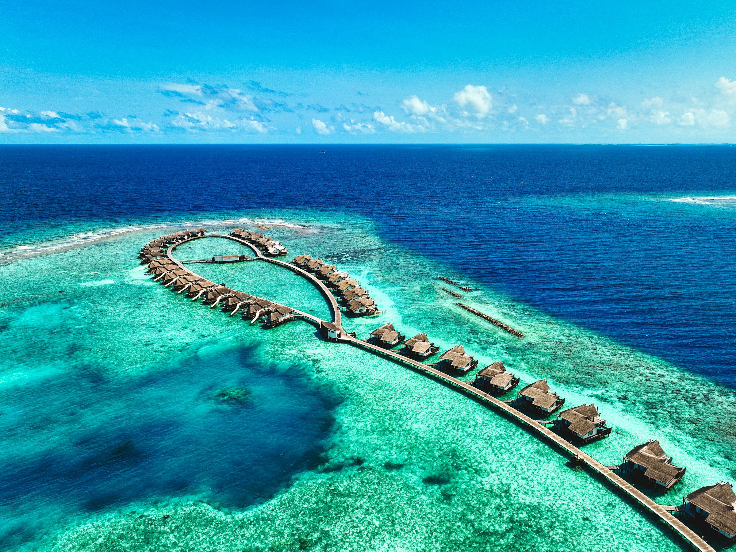 Aerial view of a Maldives island resort