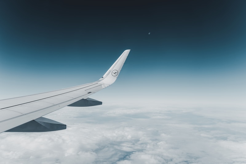 Airplane flying above the clouds
